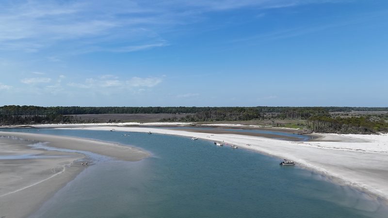 The Cherry Grove Inlet at low tide looking toward Hog Island — shallow enough to swim across